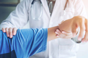 Doctor consulting with patient Shoulder problems Physical therapy diagnosing concept